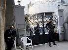 Egyptian soldiers stand guard in front of the U.S. National Democratic Institute, an NGO rights group in downtown Cairo on December 29, 2011. Egyptian soldiers stand guard in front of the U.S. National Democratic Institute, an NGO rights group in downtown Cairo on December 29, 2011.