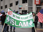 January 2010: Muslim-Americans protest against terrorism outside a federal court building in Detroit, where "Christmas Day" bomber Umar Farouk Abdulmutallab was being arraigned. January 2010: Muslim-Americans protest against terrorism outside a federal court building in Detroit, where "Christmas Day" bomber Umar Farouk Abdulmutallab was being arraigned.