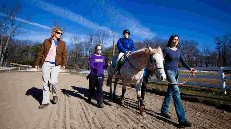 Ryan Shank-Rowe, 9, takes part in a therapeutic riding program at Little Full Cry Farm in Clifton, Va., last month. Ryan Shank-Rowe, 9, takes part in a therapeutic riding program at Little Full Cry Farm in Clifton, Va., last month.