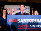 Republican presidential hopeful and former U.S. Sen. Rick Santorum speaks to supporters, flanked by his daughter, Elizabeth (left), and wife, Karen. Republican presidential hopeful and former U.S. Sen. Rick Santorum speaks to supporters, flanked by his daughter, Elizabeth (left), and wife, Karen.