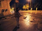 A Syrian rebel stands guard at a street in Idlib, Syria, Wednesday, Feb. 8, 2012. A Syrian rebel stands guard at a street in Idlib, Syria, Wednesday, Feb. 8, 2012.