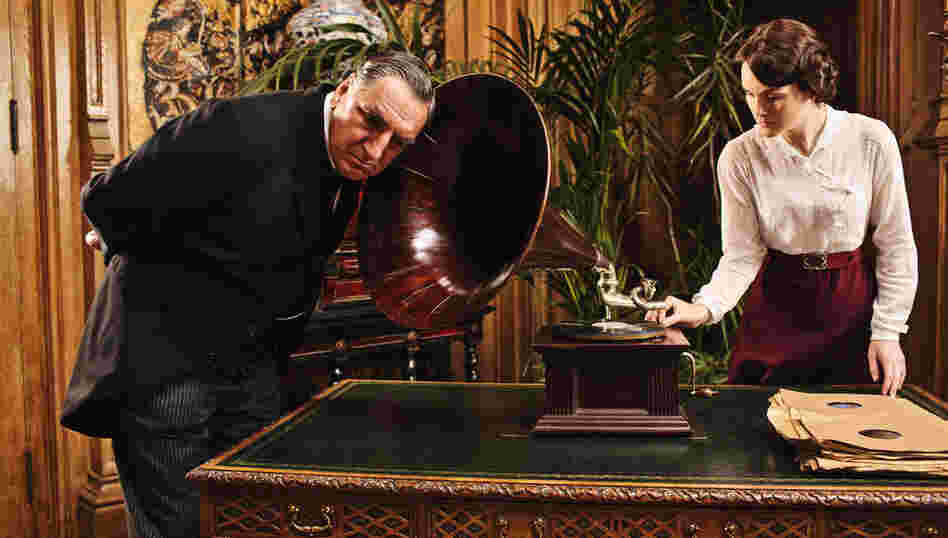 Listen Carefully: Some phrases have made it into Downton Abbey that are a little ahead of their time. Above, Mr. Carson (Jim Carter) tries out a newfangled gadget with Lady Mary (Michelle Dockery). Listen Carefully: Some phrases have made it into Downton Abbey that are a little ahead of their time. Above, Mr. Carson (Jim Carter) tries out a newfangled gadget with Lady Mary (Michelle Dockery).