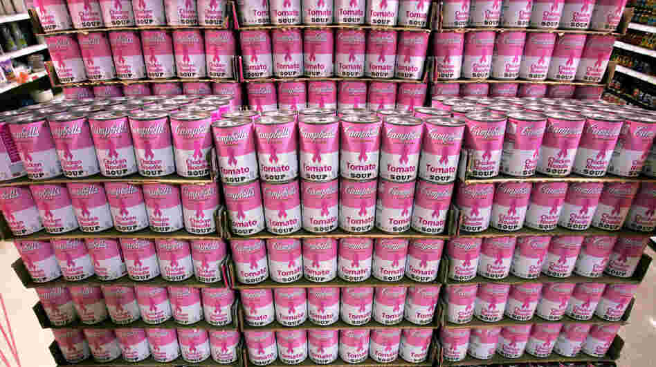 Walking arm in arm with charities offers benefits — and potential backlash — for corporations. Here a large display of pink-labeled Campbell's soups stands in an aisle at a New Jersey Wegman's store in 2007. 