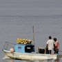 Fishermen work near the Scarabeo-9 oil rig off the coast of Cuba. U.S. officials are concerned about the potential impact in the case of a spill. Fishermen work near the Scarabeo-9 oil rig off the coast of Cuba. U.S. officials are concerned about the potential impact in the case of a spill.