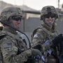 American soldiers Kris Kuntz (left) and Hayley Barner in Afghanistan, near the border with Pakistan, last October.