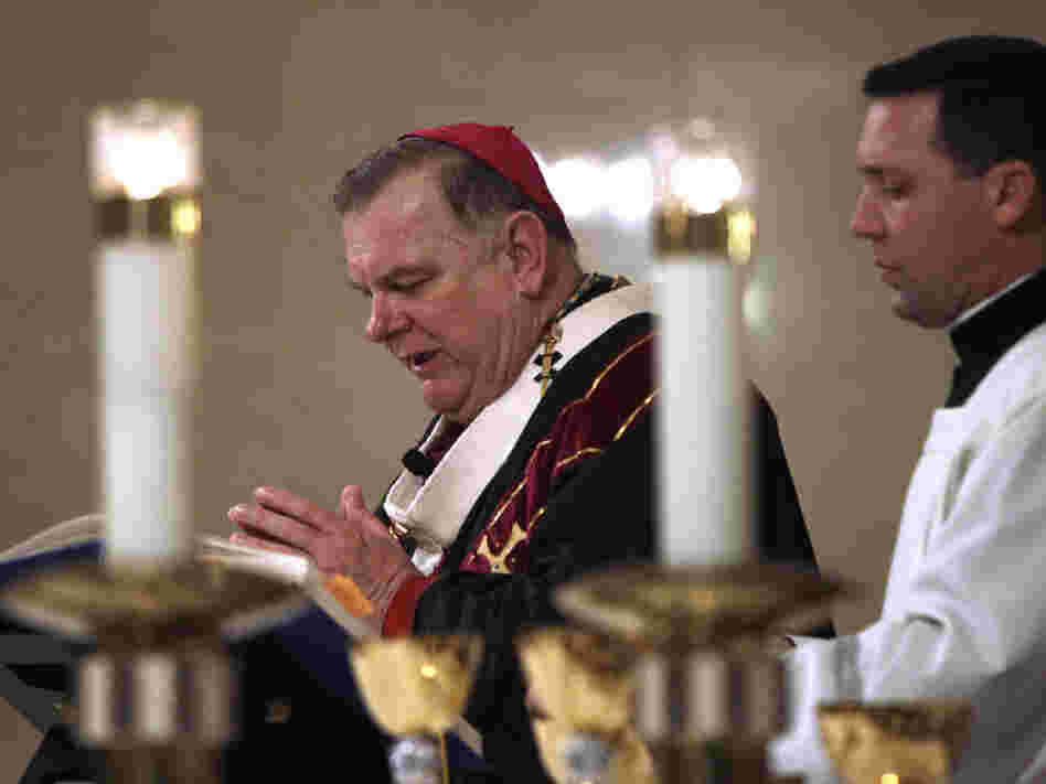 Archbishop Thomas Wenski, shown celebrating Mass at the Cathedral of St. Mary in Miami last month, says the new birth control policy is a "smoke screen."