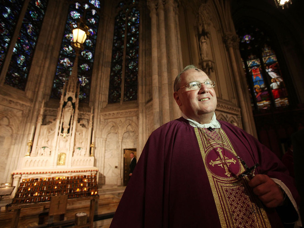 Archbishop Timothy M. Dolan, head of the U.S. Conference of Catholic Bishops, shown at Ash Wednesday services at Saint Patrick's Cathedral last year, has called the Obama administration's decision "a first step in the right direction."