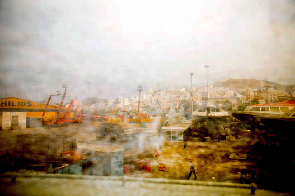 The view of Perama, a port city and one of the poorest areas near Athens, Greece. The city has been one of the hardest-hit during the economic crisis. The view of Perama, a port city and one of the poorest areas near Athens, Greece. The city has been one of the hardest-hit during the economic crisis.