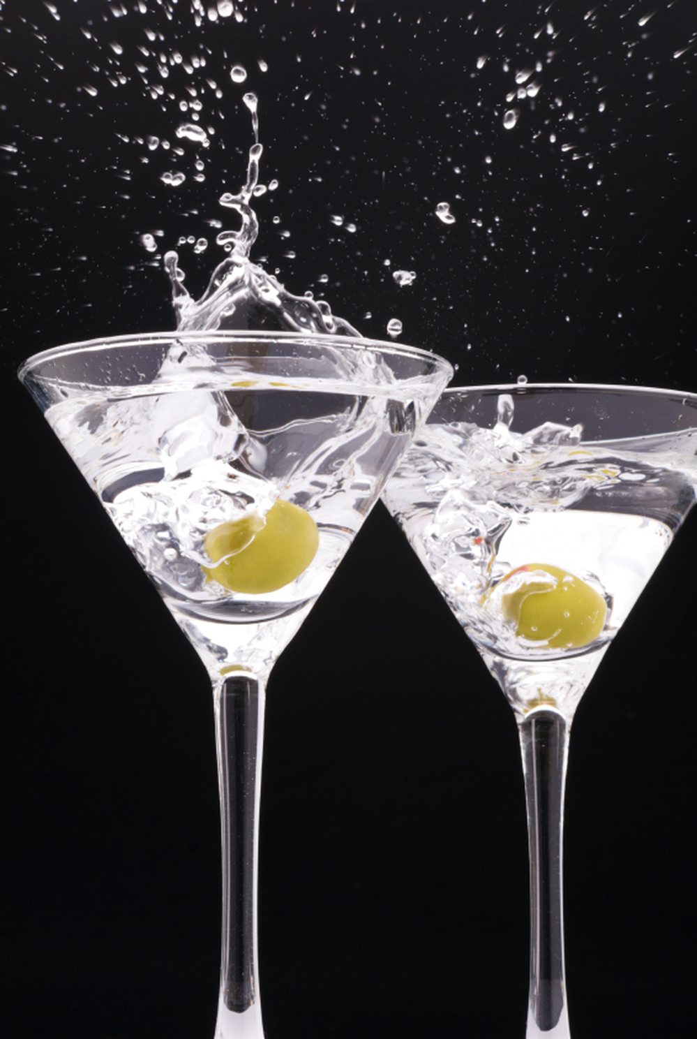 two splashing glasses