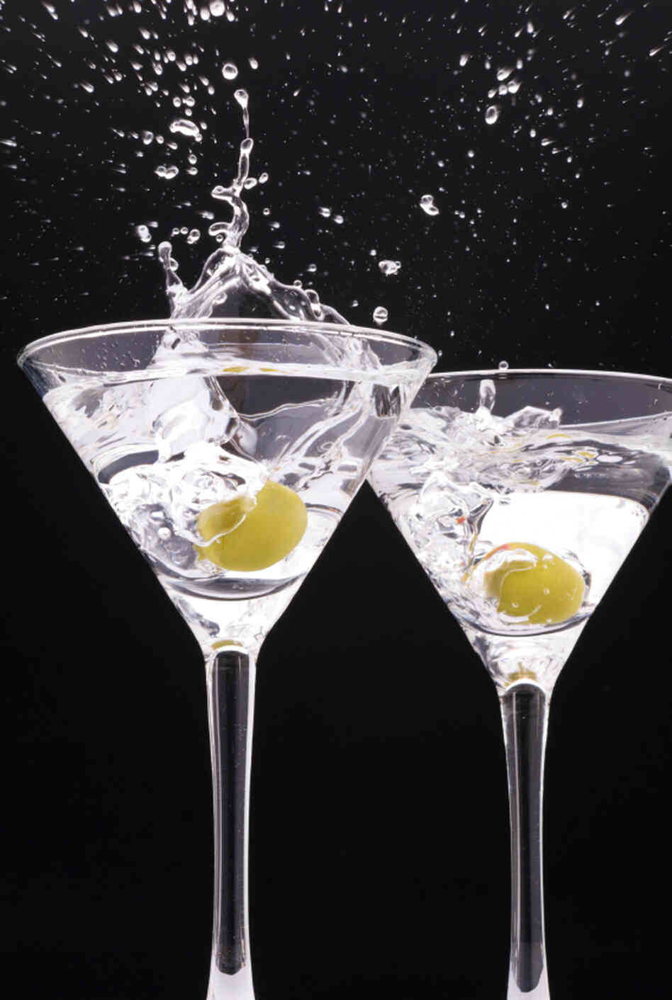 two splashing glasses
