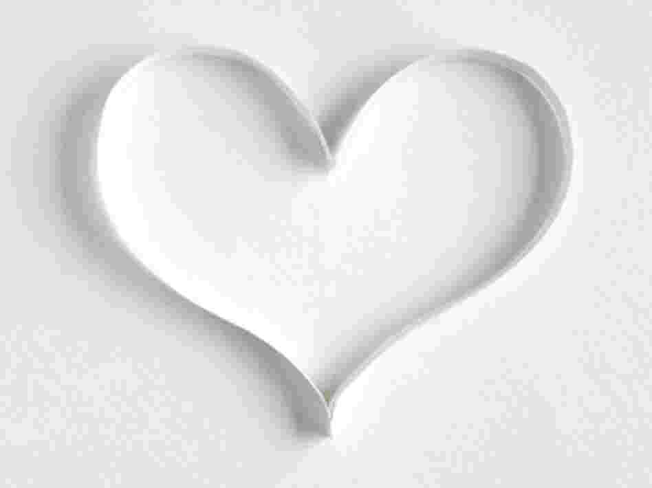 Heart made of paper on white background Heart made of paper on white background
