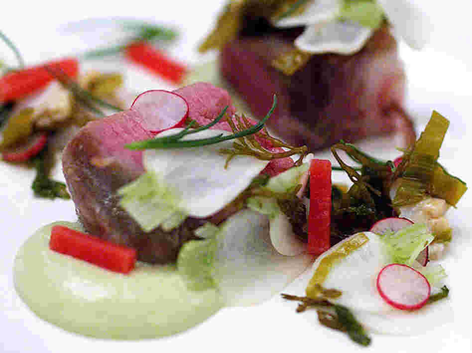 Slow-cooked pork with geoduck clam and fresh seaweeds.