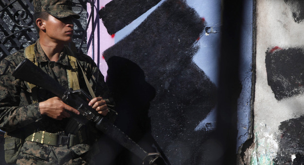 A soldier guards the area where ousted President Manuel Zelaya was kept after returning to Honduras in 2010.