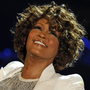 Whitney Houston performs in Germany in 2009. The singer died Saturday, leaving behind a superstar career riddled with achievements.