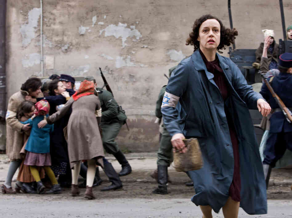 Paulina Chiger, played by Maria Schrader in Holland's film In Darkness, flees from Nazis rounding up Jews on the streets of Lvov. Chiger's daughter Krystyna tells NPR that the film is an accurate portrayal of how Leopold Socha sheltered her family in the city's sewers. Paulina Chiger, played by Maria Schrader in Holland's film In Darkness, flees from Nazis rounding up Jews on the streets of Lvov. Chiger's daughter Krystyna tells NPR that the film is an accurate portrayal of how Leopold Socha sheltered her family in the city's sewers.