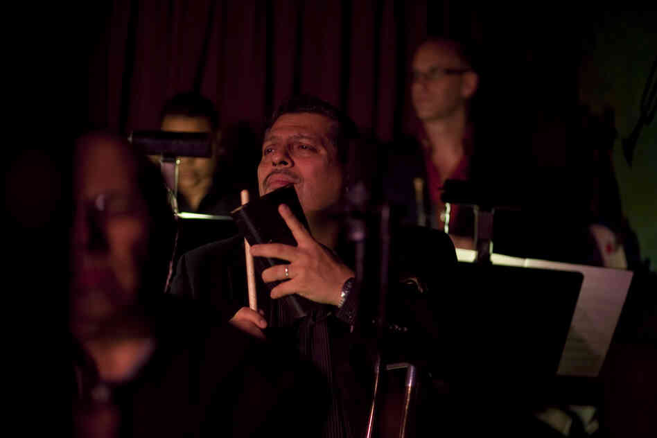 Trombonist Luis Bonilla supplies auxiliary percussion.