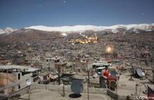 An image from the Local Coordinating Committees of Syria website shows the mountain town of Zabadani in the distance, during a barrage on Feb. 9. An image from the Local Coordinating Committees of Syria website shows the mountain town of Zabadani in the distance, during a barrage on Feb. 9.