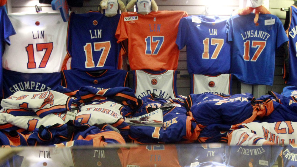 Jeremy Lin items are for sale before the basketball game between Lin's New York Knicks and the Sacramento Kings on Wednesday in New York.