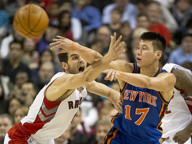 New York Knicks star Jeremy Lin (shown here during first-half action against the Toronto Raptors on Tuesday) has taken the NBA by storm. Now, Chinese basketball fans are claiming the California native as their own.