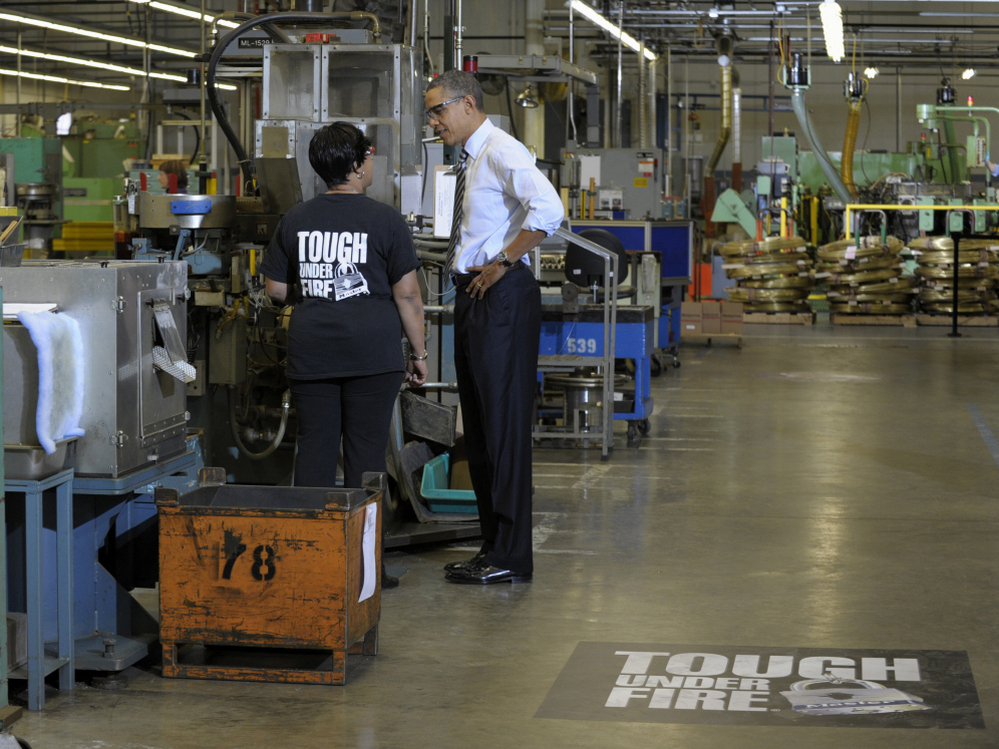 President Obama extolled U.S. manufacturing at Master Lock in Milwaukee as some experts said a return to the nation's industrial past may not be the best path forward.   