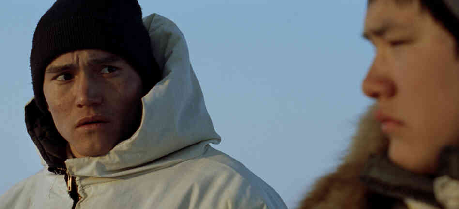 In isolated Barrow, Alaska, a fight between three boys over a girl turns violent, leaving Aivaaq (Frank Qutuq Irelan, left) and Qalli (Josiah Patkotak) with a secret that tests the bonds of their friendship. In isolated Barrow, Alaska, a fight between three boys over a girl turns violent, leaving Aivaaq (Frank Qutuq Irelan, left) and Qalli (Josiah Patkotak) with a secret that tests the bonds of their friendship.