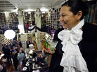 Chilean artist Magaly Ponce looks out from the mezzanine at the Oscar Wilde party at the Providence Athenaeum. Chilean artist Magaly Ponce looks out from the mezzanine at the Oscar Wilde party at the Providence Athenaeum.