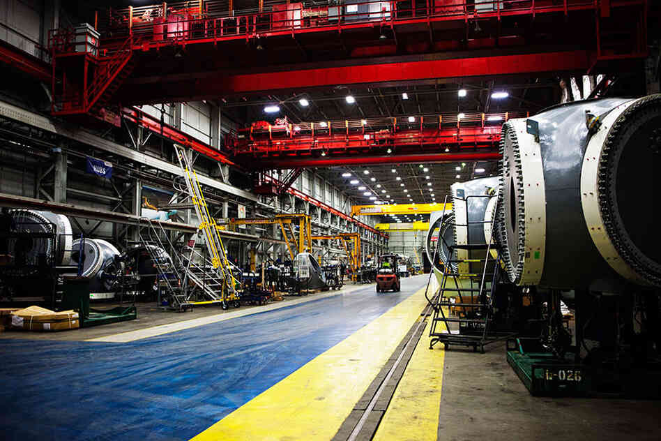 Gamesa's factory is a cavernous building that once housed a U.S. Steel foundry. It's about the length of two football fields and produces one nacelle per day.