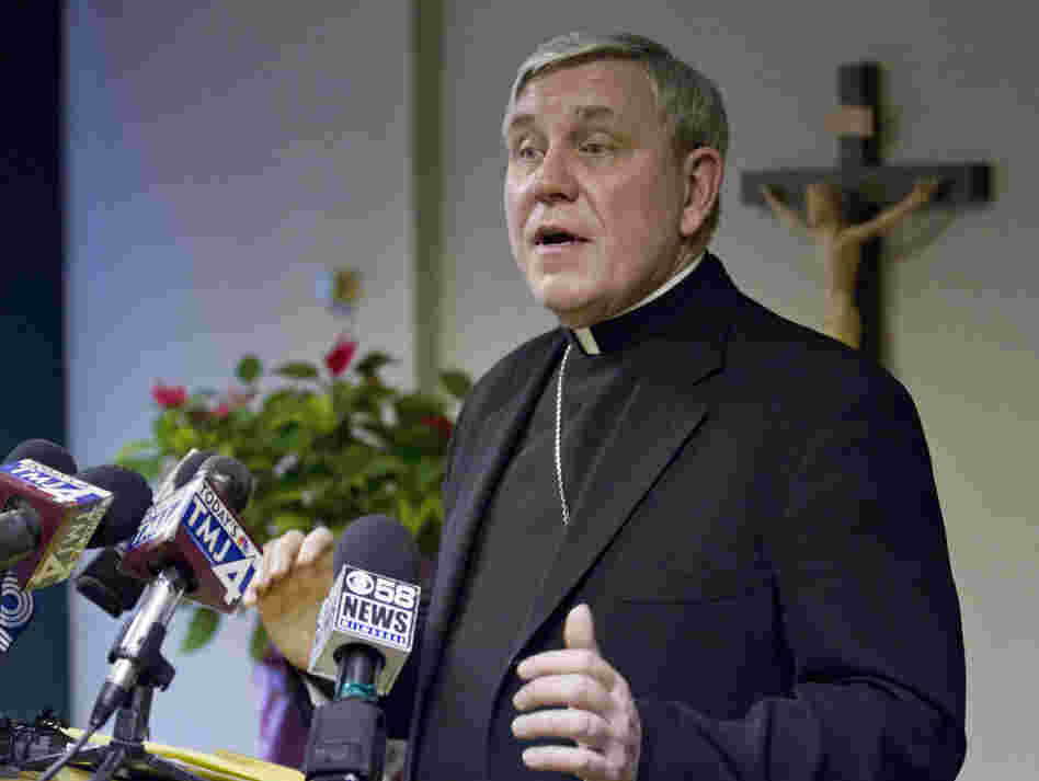 Milwaukee Archbishop Jerome Listecki answers questions at a news conference Jan. 4 in St. Francis, Wis. Listecki said the Archdiocese of Milwaukee is directing its attorneys to file for Chapter 11 bankruptcy, saying that pending sexual abuse lawsuits have left it with financial claims that exceed its means. Milwaukee Archbishop Jerome Listecki answers questions at a news conference Jan. 4 in St. Francis, Wis. Listecki said the Archdiocese of Milwaukee is directing its attorneys to file for Chapter 11 bankruptcy, saying that pending sexual abuse lawsuits have left it with financial claims that exceed its means.