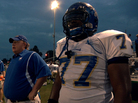 North Memphis' Manassas Tigers Coach Bill Courtney and player O.C. Brown stand on the sidelines in a scene from the Oscar-nominated documentary Undefeated. North Memphis' Manassas Tigers Coach Bill Courtney and player O.C. Brown stand on the sidelines in a scene from the Oscar-nominated documentary Undefeated.