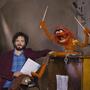 Bret McKenzie (left) wrote five of the songs in The Muppets, including the Oscar-nominated "Man or Muppet" and the opening number, "Life's a Happy Song."