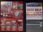 Signs for "Bypass Burgers" and "Flatliner Fries" are seen in the window of the Heart Attack Grill in Las Vegas. A man who suffered a heart attack in the restaurant was wheeled out on a stretcher Saturday. Signs for "Bypass Burgers" and "Flatliner Fries" are seen in the window of the Heart Attack Grill in Las Vegas. A man who suffered a heart attack in the restaurant was wheeled out on a stretcher Saturday.