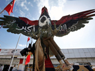 A falcon statue, painted in the colors of the revolutionary flag and covered with the inscription "God is great", and is displayed outside the museum set up on Tripoli boulevard in Misrata on Feb. 12. A falcon statue, painted in the colors of the revolutionary flag and covered with the inscription "God is great", and is displayed outside the museum set up on Tripoli boulevard in Misrata on Feb. 12.