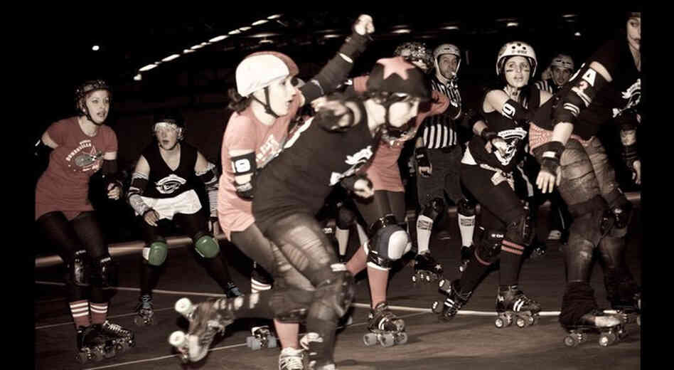 This Saturday, the Berlin Bombshells will be opening the Roller Derby season at Arena Berlin. Above, "blockers" try to stop the "jammer" (star helmet), from making it through the pack by blocking them with their shoulders or hips. This Saturday, the Berlin Bombshells will be opening the Roller Derby season at Arena Berlin. Above, "blockers" try to stop the "jammer" (star helmet), from making it through the pack by blocking them with their shoulders or hips.