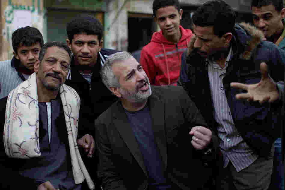Shadid was one of the signature chroniclers of the 2011 revolution in Egypt for The New York Times. Here he talks with residents of Cairo's impoverished Imbaba neighborhood. 