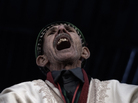 An elderly man shouts religous slogans as Libyans celebrate the 1st anniversary marking the start of the Libyan uprising against Moammar Gadhafi in Freedom Square in the eastern city of Benghazi. An elderly man shouts religous slogans as Libyans celebrate the 1st anniversary marking the start of the Libyan uprising against Moammar Gadhafi in Freedom Square in the eastern city of Benghazi.