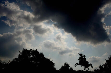 A dark cloud passes over a statue of Napoleon in Vienna. A dark cloud passes over a statue of Napoleon in Vienna.