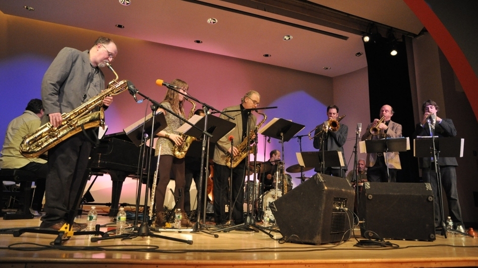  The Either/Orchestra at the New School in New York City from left to right: Charlie Kohlhase, Hailey Niswanger, Russ Gershon, saxophones; Joel Yennior, trombone; Tom Halter and Dan Rosenthal, trumpets; Gilson Schachnik, piano; Rick McLaughlin, bass; Pablo Bencid, drums; Vicente Lebron, percussion. 