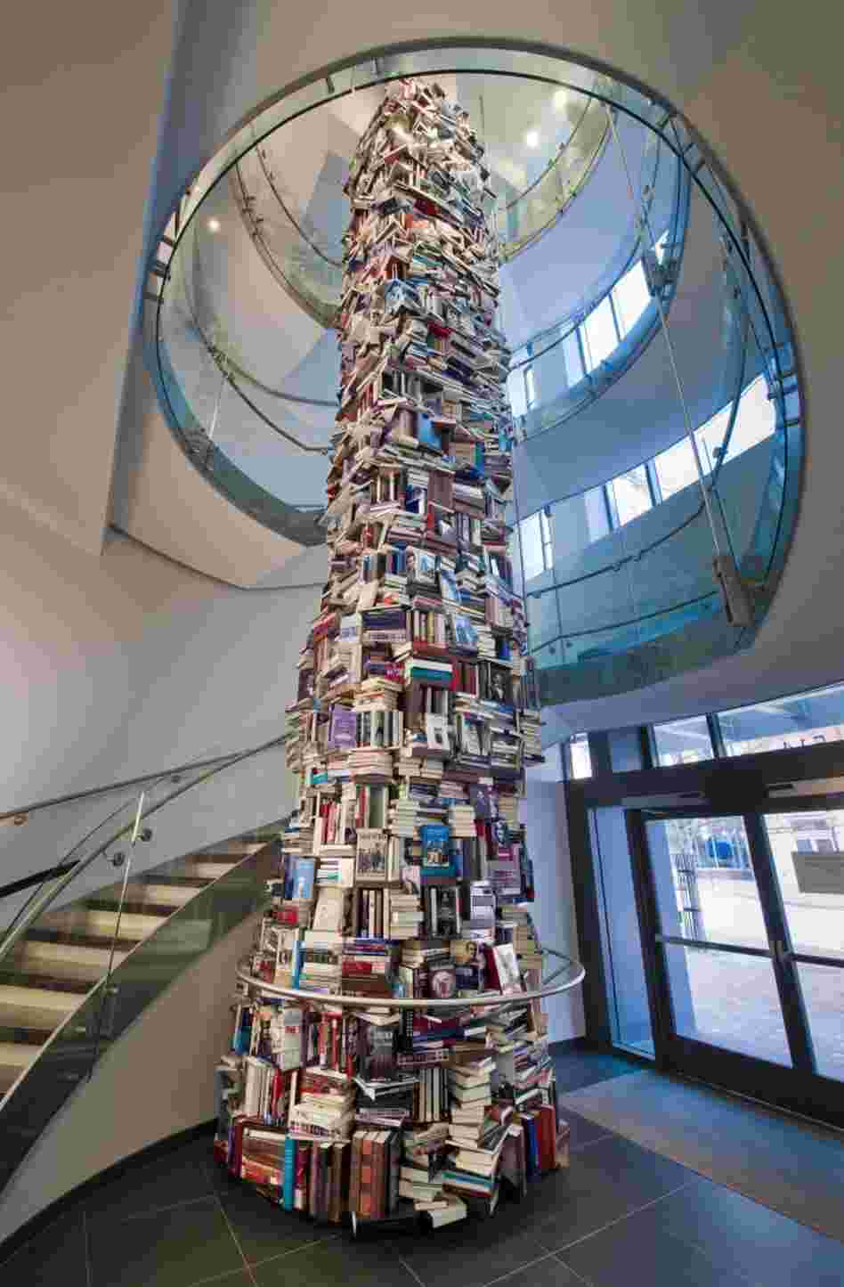 The Abraham Lincoln book tower stands 34 feet tall and 8 feet around in the lobby of the new Ford's Theatre Center for Education and Leadership in Washington, D.C. Click here to see the tower from the top down.