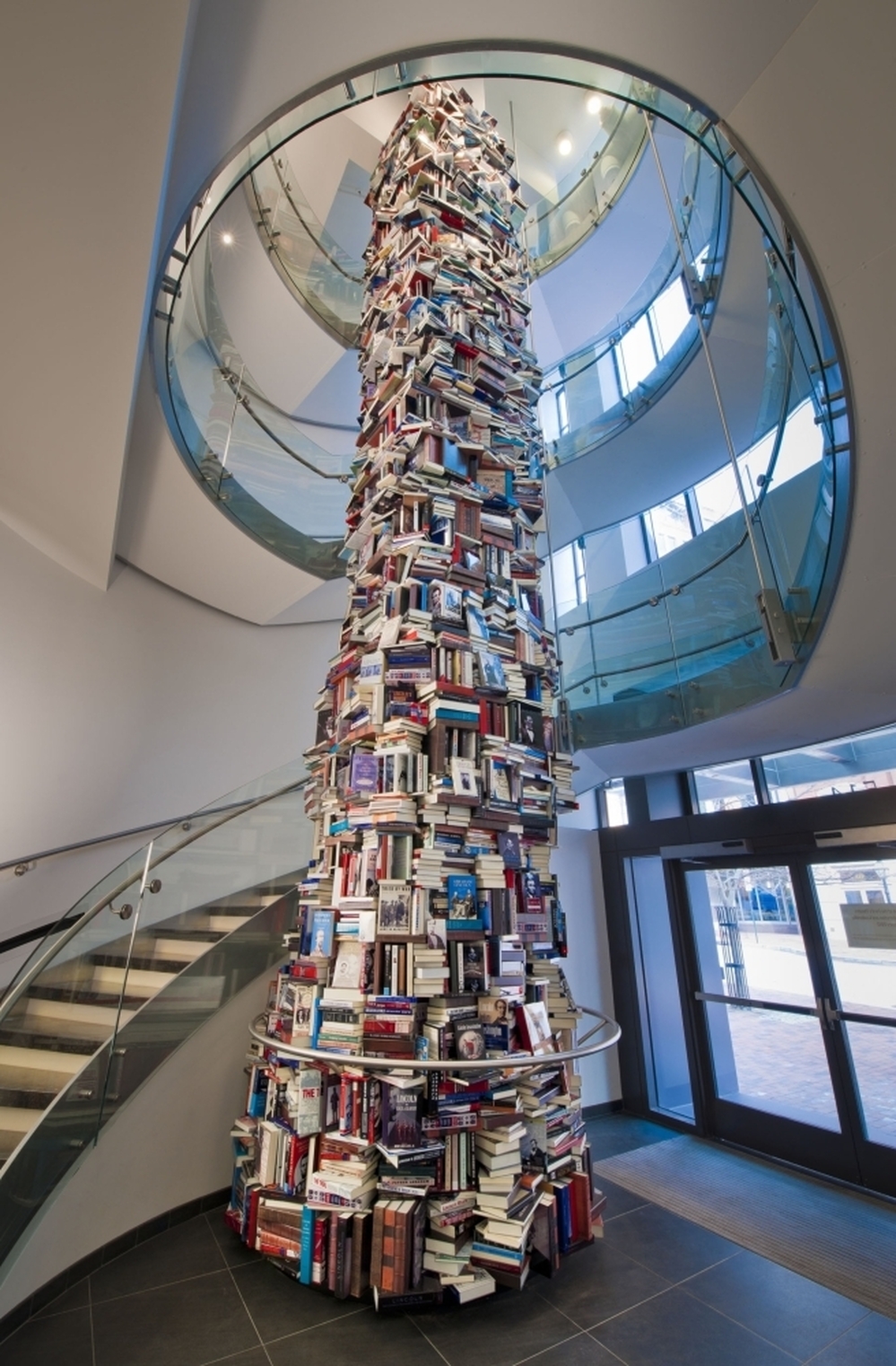The Abraham Lincoln book tower stands 34 feet tall and 8 feet around in the lobby of the new Ford's Theatre Center for Education and Leadership in Washington, D.C. Click here to see the tower from the top down.