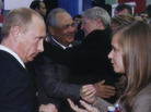 The documentary Putin's Kiss charts four years in the life of Masha Drokova, who became famous as the girl who publicly kissed Vladimir Putin. The documentary Putin's Kiss charts four years in the life of Masha Drokova, who became famous as the girl who publicly kissed Vladimir Putin.