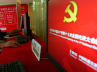 Staff members use computers at a press center in Beijing. Security experts say hacking of U.S. computers from China is becoming an increasing problem. Staff members use computers at a press center in Beijing. Security experts say hacking of U.S. computers from China is becoming an increasing problem.