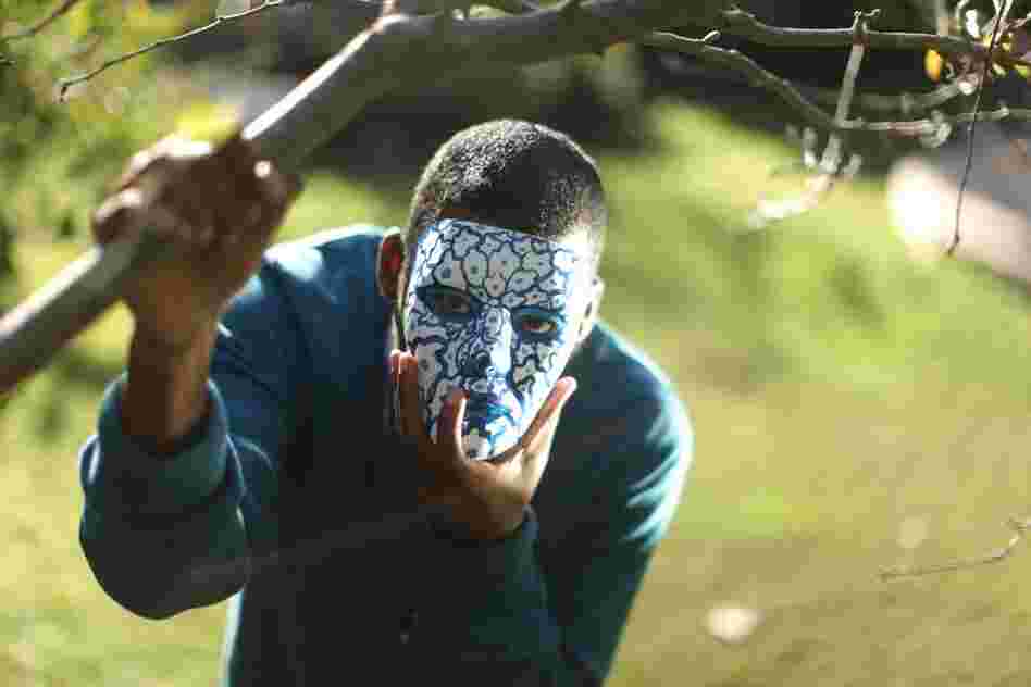 The producer and DJ Flying Lotus wears a mask made by Los Angeles-based artist Leigh McCloskey. 