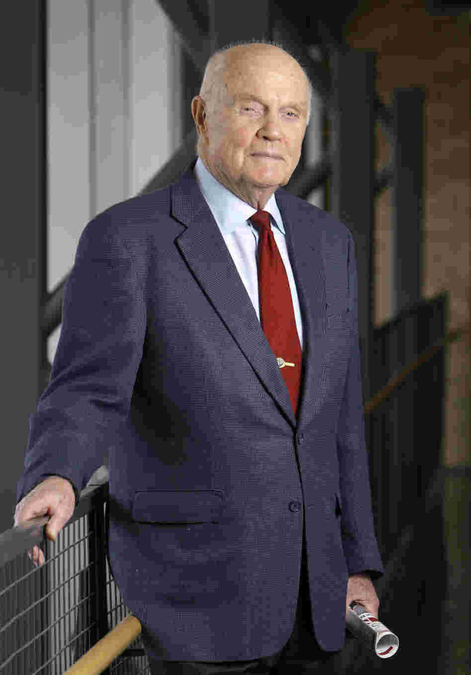 As a U.S. senator at age 77, Glenn also became the oldest person in space by orbiting Earth with six astronauts aboard the space shuttle Discovery in 1998. As a U.S. senator at age 77, Glenn also became the oldest person in space by orbiting Earth with six astronauts aboard the space shuttle Discovery in 1998.