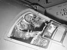 Marine Lt. Col. John Glenn demonstrates operations inside a Mercury capsule on Jan. 11, 1961. Marine Lt. Col. John Glenn demonstrates operations inside a Mercury capsule on Jan. 11, 1961.
