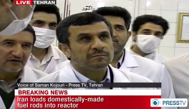 Iran's state-run Press TV showed images of Iranian President Mahmoud Ahmadinejad touring Tehran's research reactor on Wednesday.