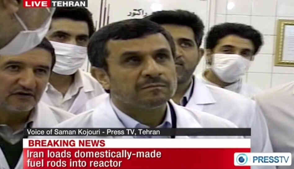 Iran's state-run Press TV showed images of Iranian President Mahmoud Ahmadinejad touring Tehran's research reactor on Wednesday.