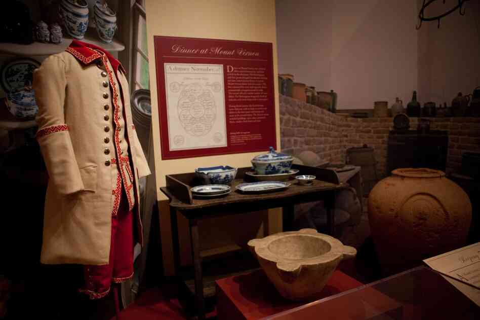 One of the uniforms made from fine wool, known as a livery, worn by the male slaves, along with a variety of kitchenware found in the home of George and Martha Washington as a new exhibition at Mount Vernon.
