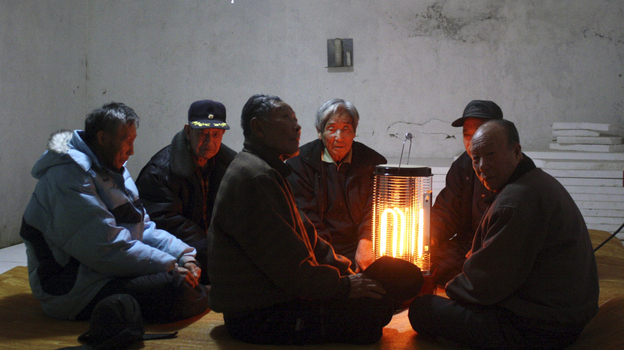 South Korean citizens gather in an underground shelter on Baengnyeong Island Monday, as their country's military began live-fire artillery drills from front-line islands near its disputed sea border with North Korea. South Korean citizens gather in an underground shelter on Baengnyeong Island Monday, as their country's military began live-fire artillery drills from front-line islands near its disputed sea border with North Korea.