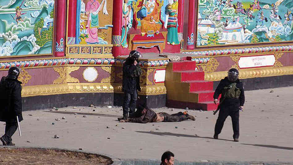 This photo, provided to freetibet.org, shows a man being forcibly detained by security forces in the town of Serther in Tibet following a clash with protesters and police. This photo, provided to freetibet.org, shows a man being forcibly detained by security forces in the town of Serther in Tibet following a clash with protesters and police.