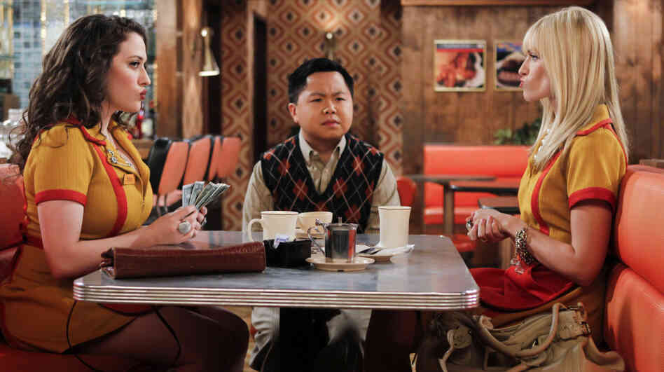 Han Lee (Matthew Moy), owner of the Brooklyn diner where Max (Kat Dennings, left) and Caroline (Beth Behrs, right) work, joins the two women as they count their earnings on 2 Broke Girls. Han Lee (Matthew Moy), owner of the Brooklyn diner where Max (Kat Dennings, left) and Caroline (Beth Behrs, right) work, joins the two women as they count their earnings on 2 Broke Girls.